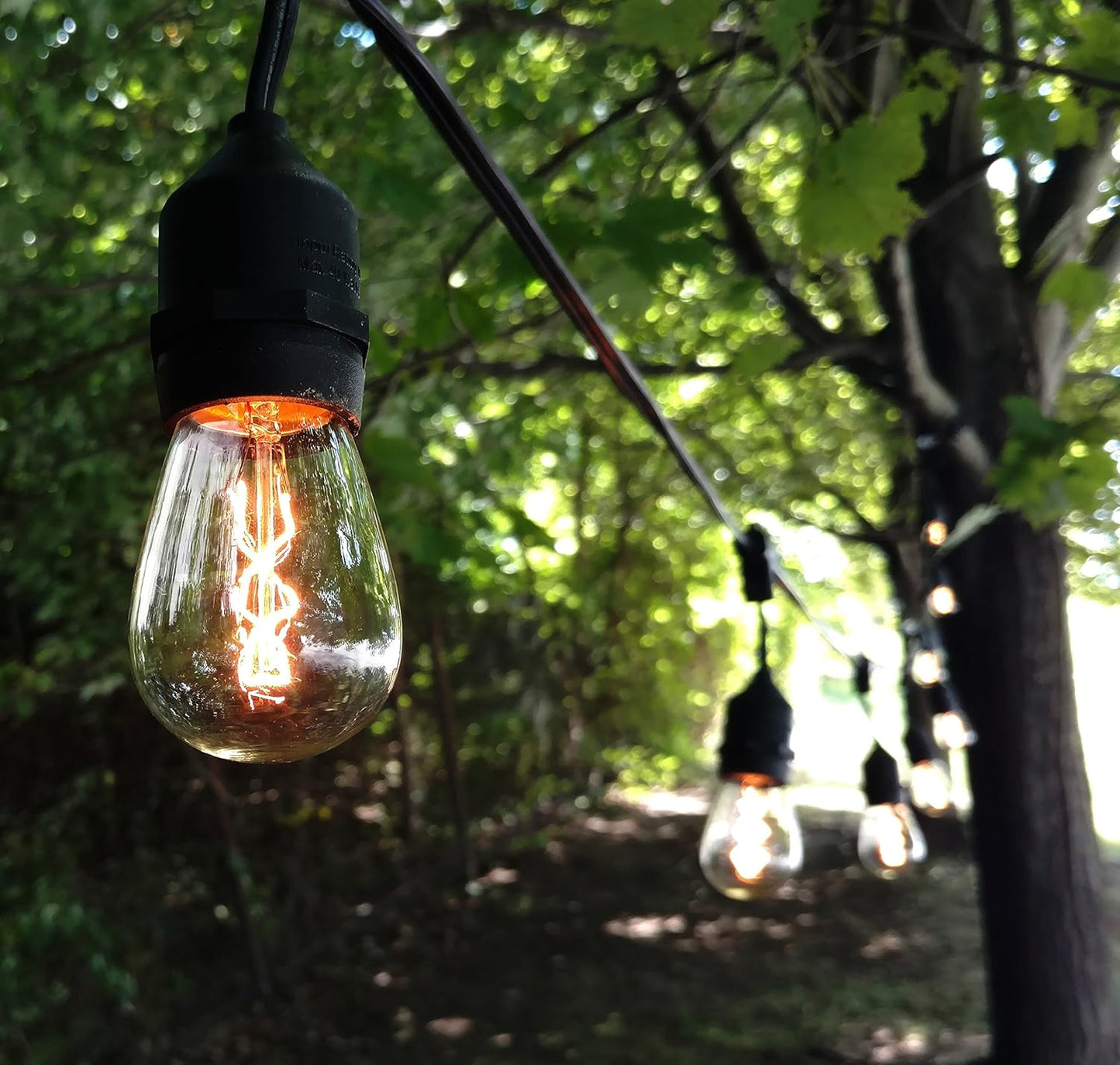 Hometown Evolution, Inc. E26 Outdoor Commercial String Lights with Suspended Socket for Weatherproof Heavy Duty Vintage Outside Lighting (S14 Zig Zag Edison 11 Watt Bulbs, 24 Foot 12 Socket)